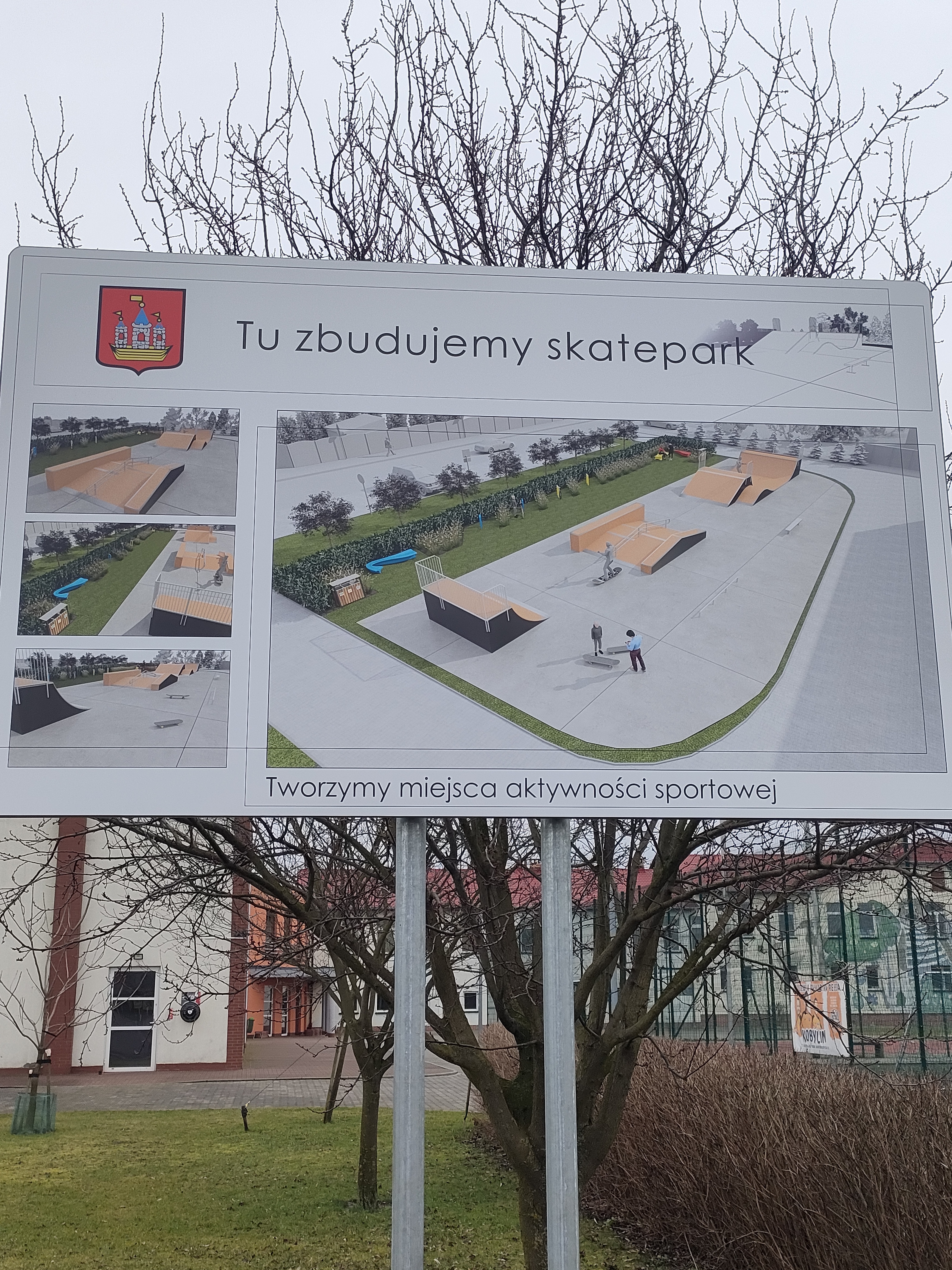 Tablica informacyjna przedstawiająca wizualizację skateparku